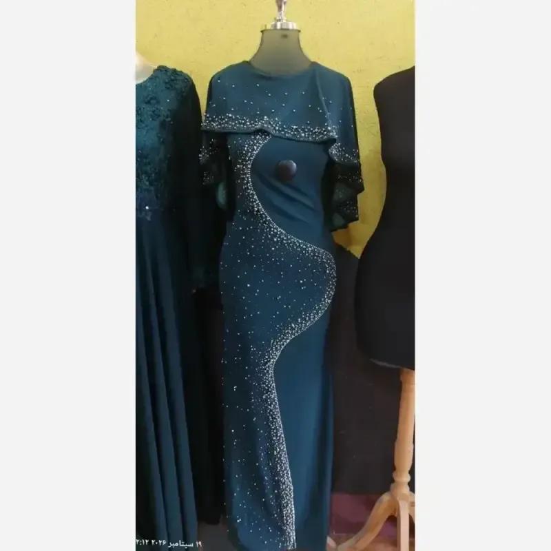 ماکسی مجلسی شنلی مدل بهاره جنس دالقیچ مروارید کوبی نگین سه سایز