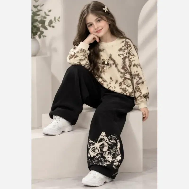 ست لباس دخترانه بلوز شلوار دورس طرح پروانه رنگ سفید کرم شکلاتی سایز 45 تا 65