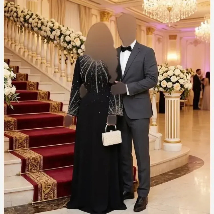 ماکسی مجلسی زنانه مشکی جنس کرپ دالقیچ سایز بزرگ نگین دار