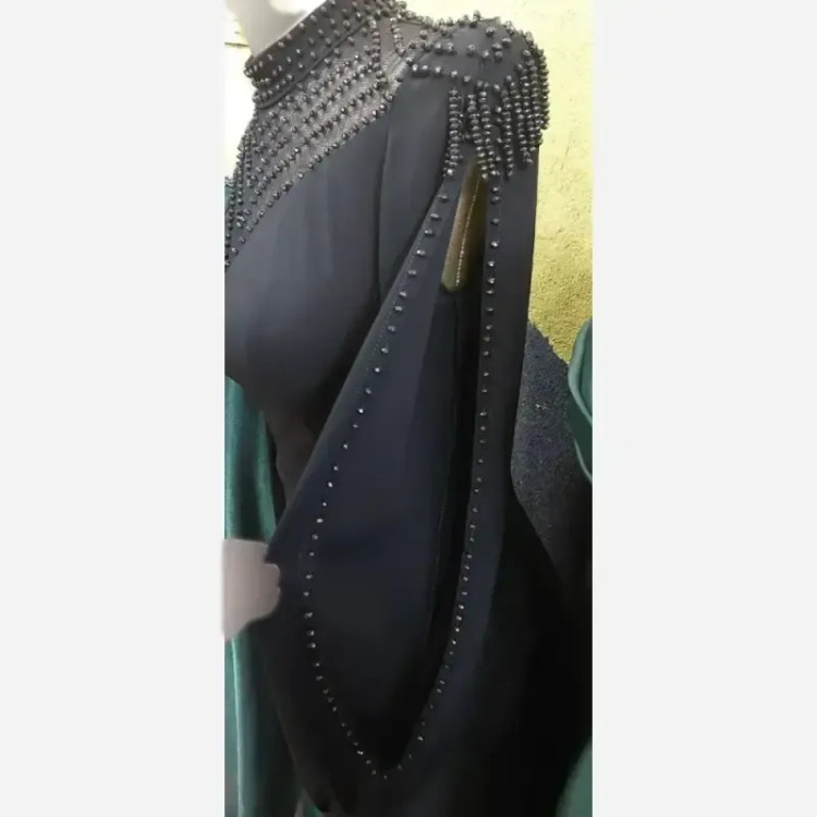 پیراهن ماکسی زنانه جنس کرپ دالقیچ سنگدوزی شده با سنگ کریستال رنگ مشکی و سرمه ای سایز بندی مختلف