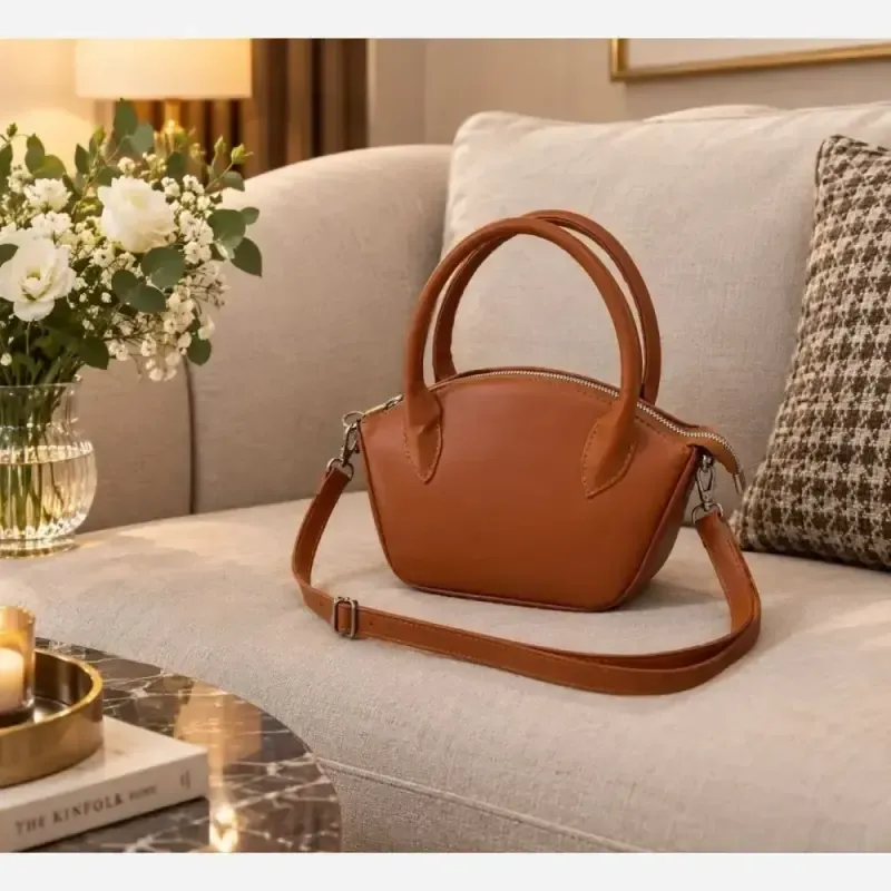 کیف دستی دوشی چرم مدل hanil سایز 15 در 20 رنگ خردلی و زرشکی
