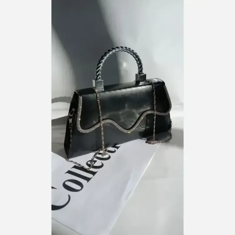کیف مجلسی شارلین چرم مشکی سایز 23 در 15 با بند دوشی زنجیری