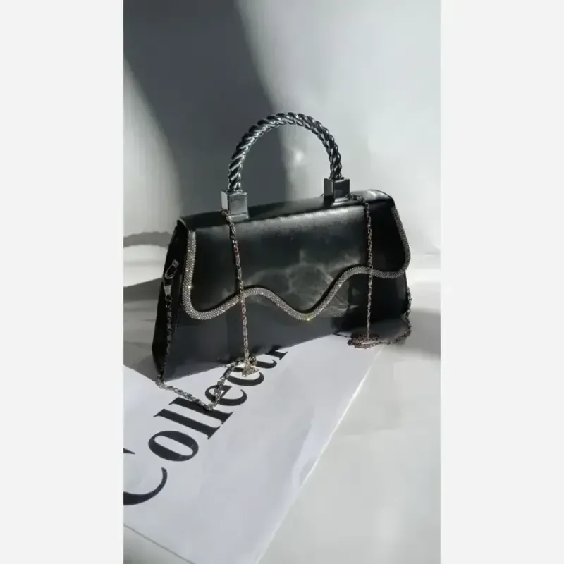 کیف مجلسی شارلین چرم مشکی سایز 23 در 15 با بند دوشی زنجیری