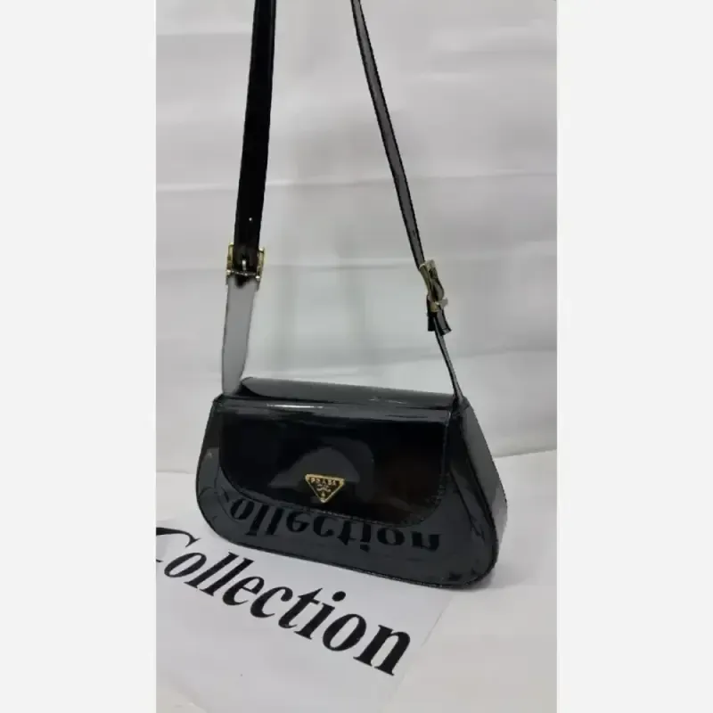 کیف مدل تیلا چرم ورنی مشکی سایز 15 در 22 سانتی متر